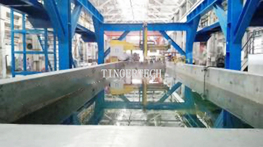 &Eacute;quipement de d&eacute;tection de d&eacute;fauts par ultrasons pour barres rondes en alliage d'aluminium moul&eacute;, immersion dans l'eau